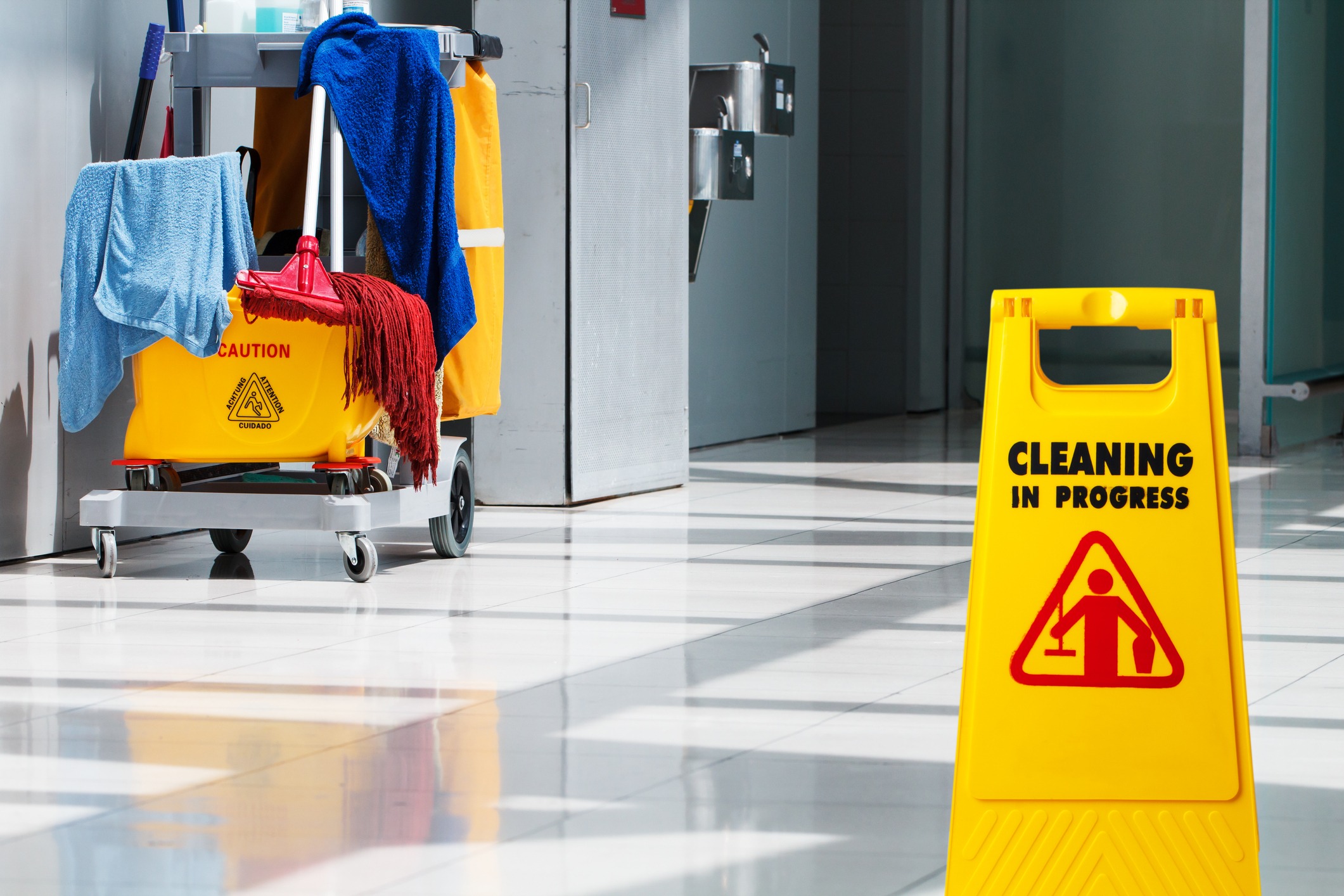 Janitorial and mop bucket on cleaning